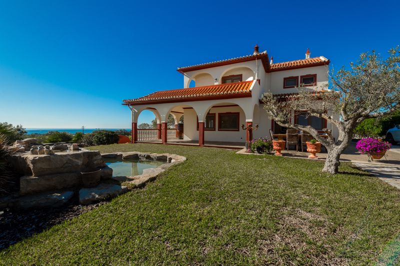 Ornamental pool, villa and view